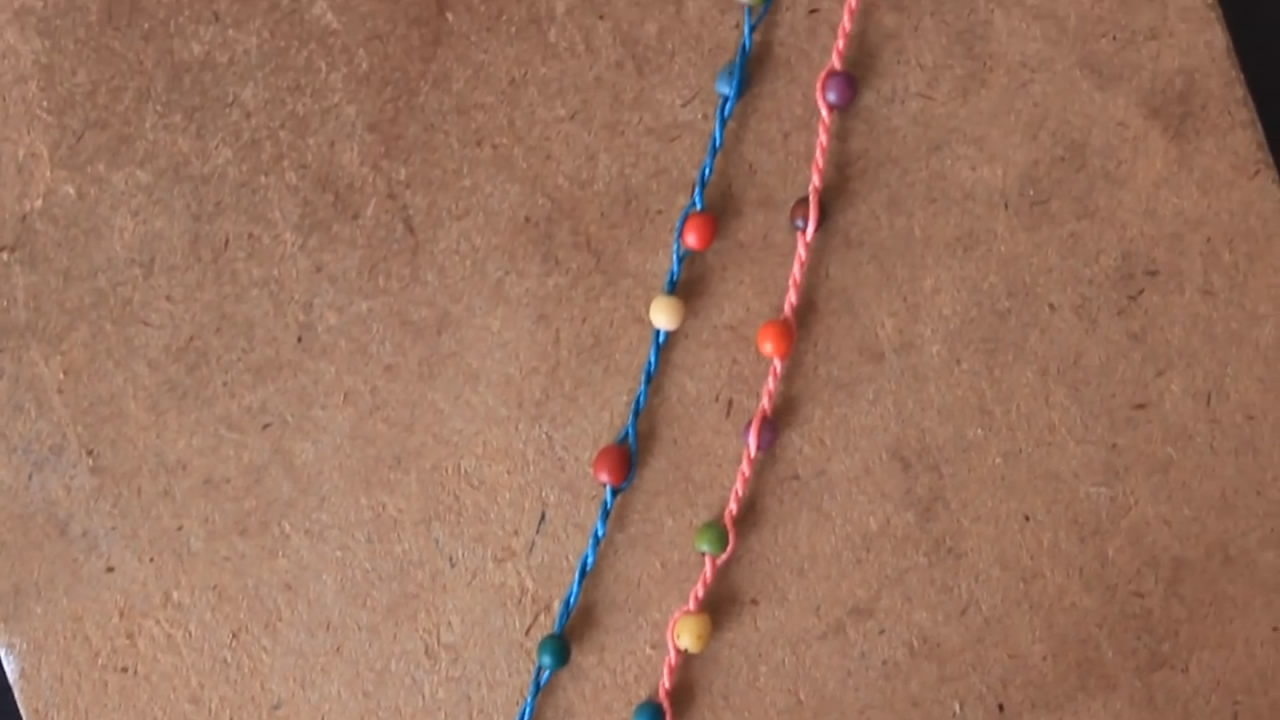 红绳手链100种编织教程完整视频,水晶手链怎么和转运珠编织在一起