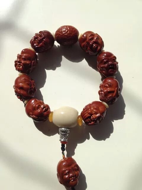 橄榄核雕怎么盘玩保养,橄榄核雕手串怎么保养和盘玩