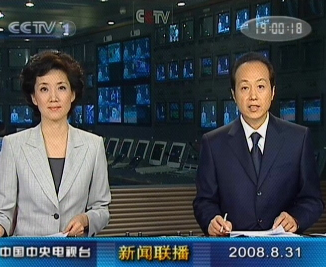 央视播音员罗京照片,央视新闻联播主持人罗京