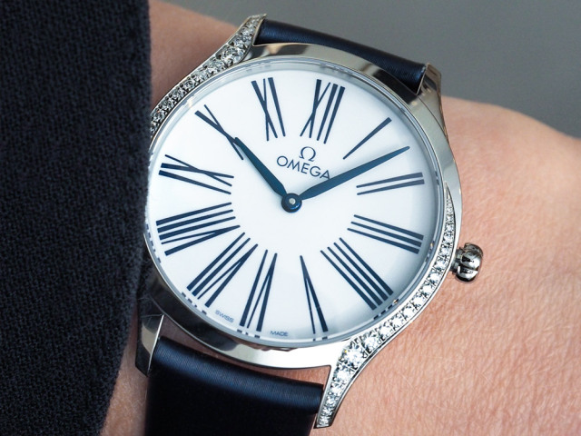 5万买欧米茄碟飞还是万国,5万预算万国和欧米茄哪个好