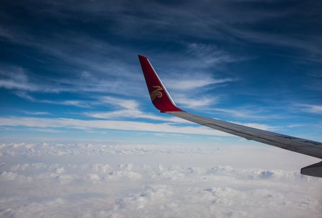 飞机高空拍摄效果图,飞机靠窗风景照片怎么拍