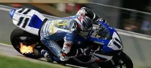 摩托车排气放炮喷火,摩托车排气管放炮是怎么回事