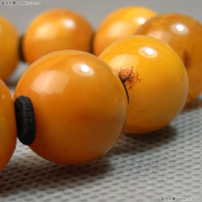 天蝎座适合戴鸡油黄蜜蜡吗,焦皮鸡油红蜜蜡变色