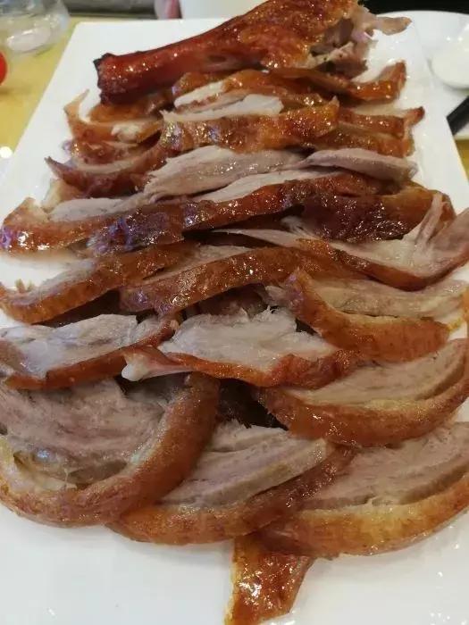 长春哪里可以买到正宗烤鸭,长春去哪吃烤鸭