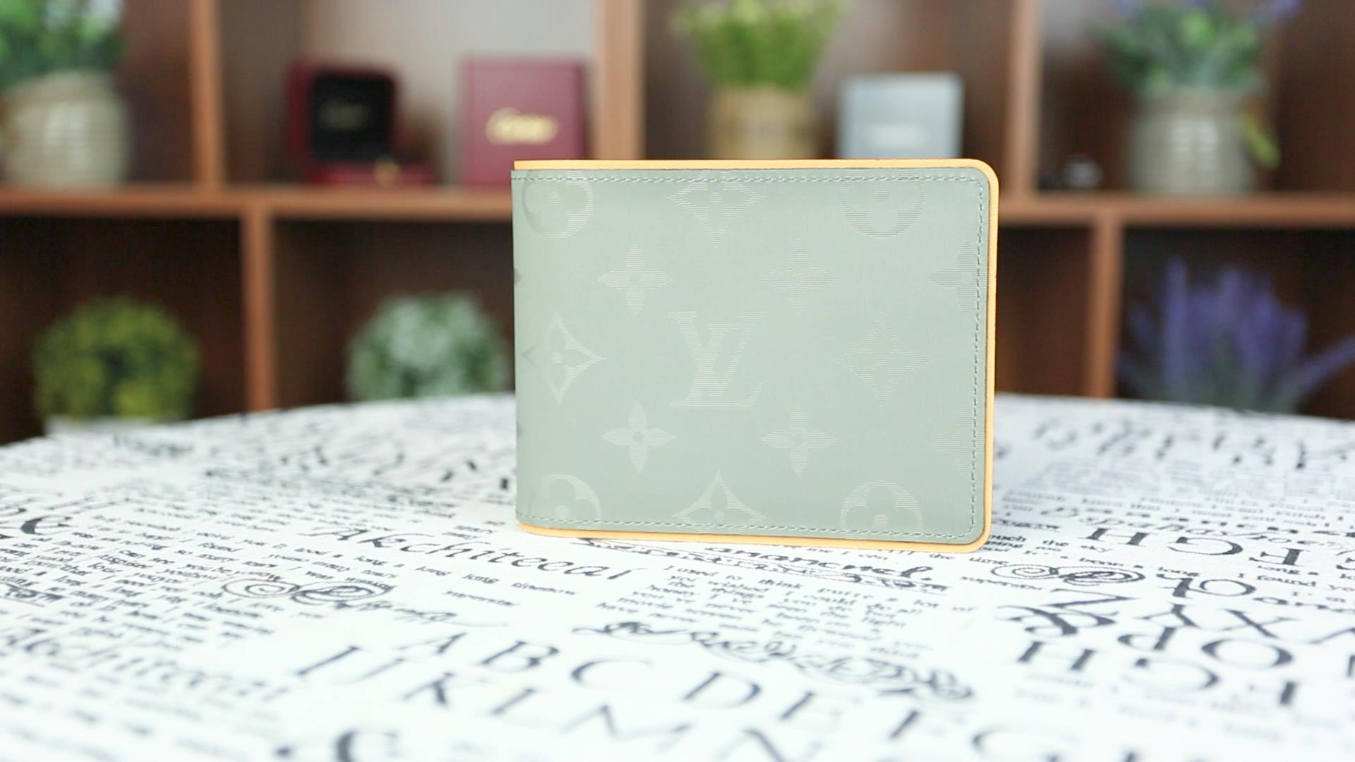 lv18ss黑银拼接长款钱包价格,lv18年新款