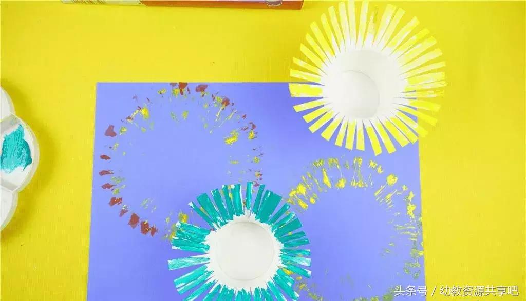 幼儿园儿童手工制作国庆节的图片,利用废品制作国庆节的手工三轮车