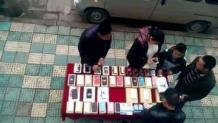 在大街上卖手机靠谱吗,街上卖苹果手机的人