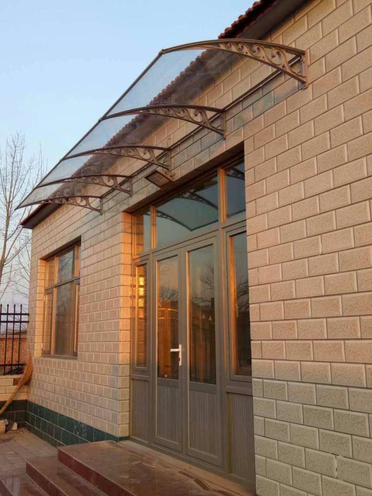 雨棚钢架制作厂家,弧形耐力板雨棚多少钱每平方