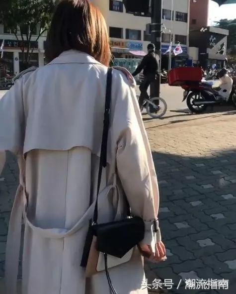 风衣腰带的蝴蝶结怎么打的视频,系风衣腰带单蝴蝶结的方法慢动作