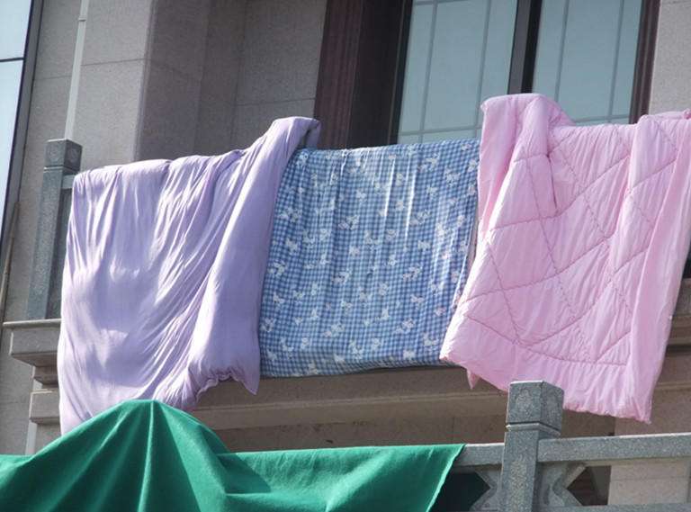 冬天晒被子可以拍打吗,晒被子一般拍打几下