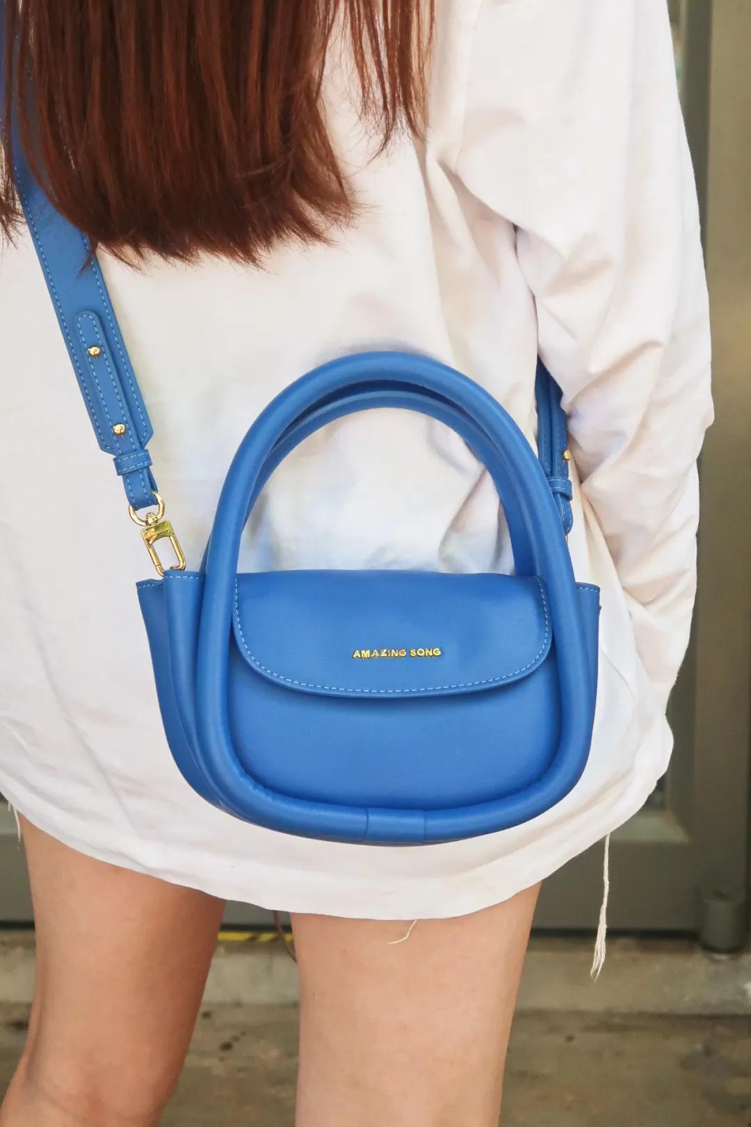 买了一大堆便宜包包,买了一个包回来发现包里有钱