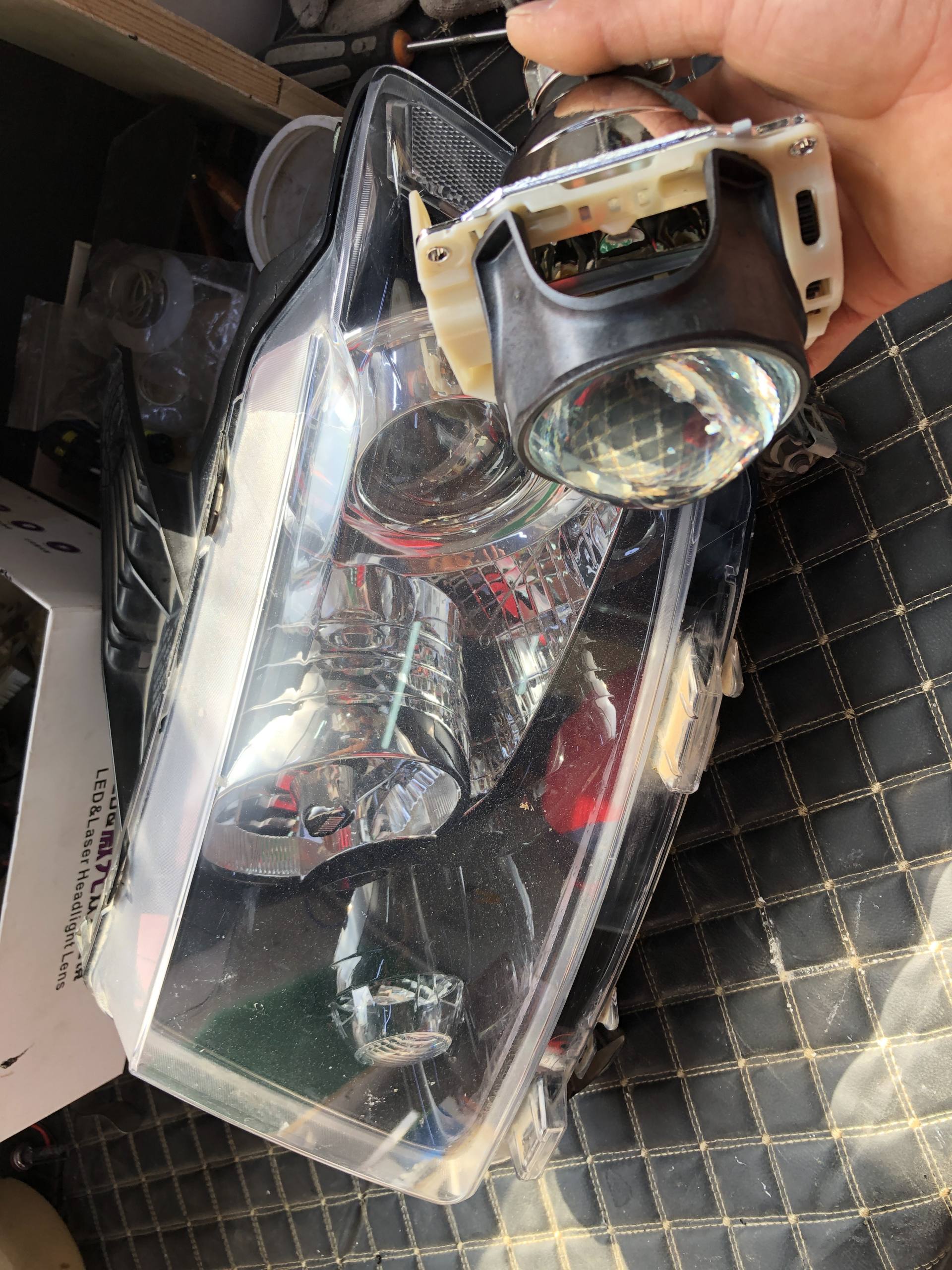 指南者改装自动大灯教程,指南者怎样自己更换车灯