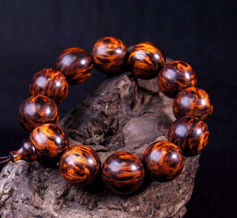 不怕水的文玩木质手串,有什么木质不怕汗文玩手串