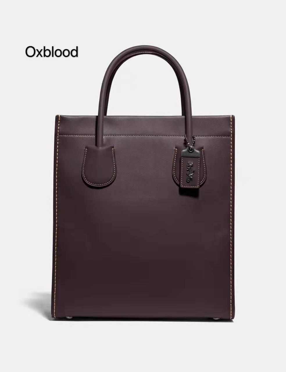 coach蔻驰与古驰是一个牌子吗,coach蔻驰经典款包包