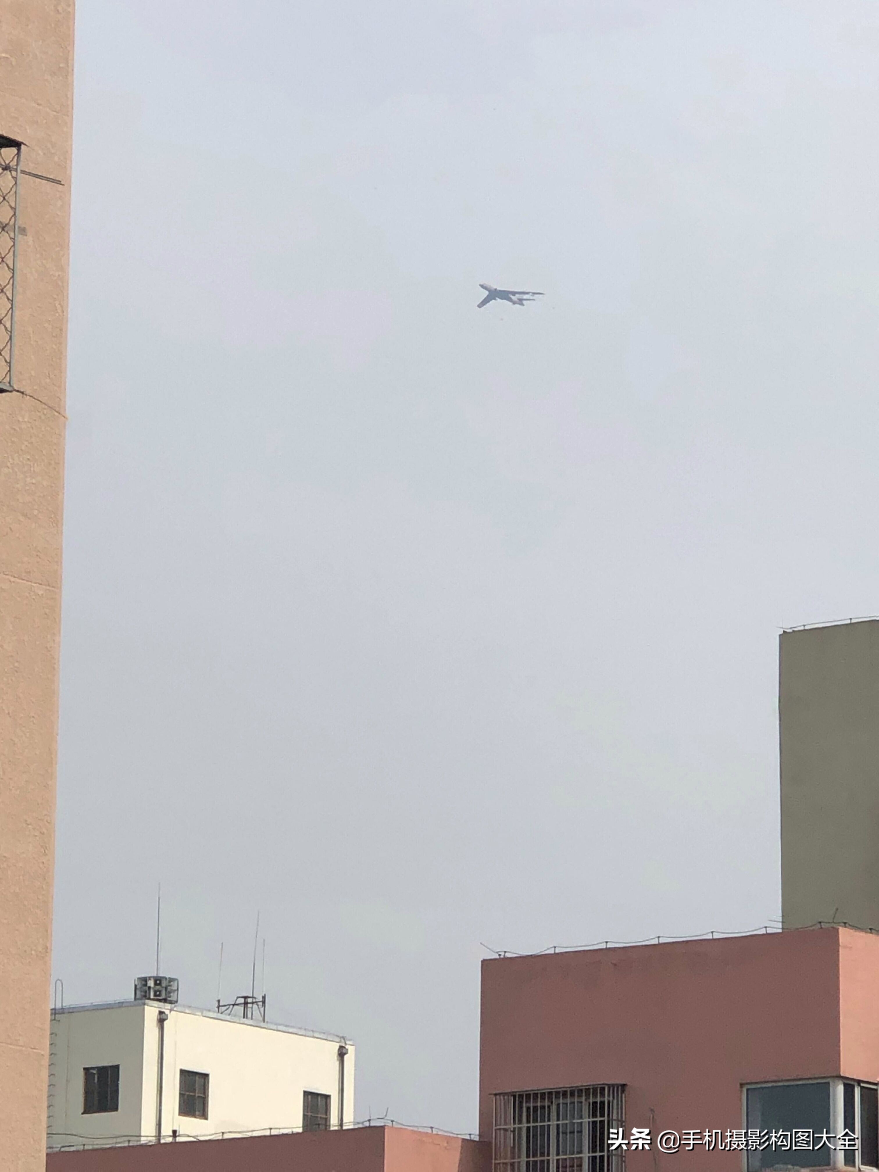 手机怎么拍倾斜摄影,拍照技巧手机摄影高楼