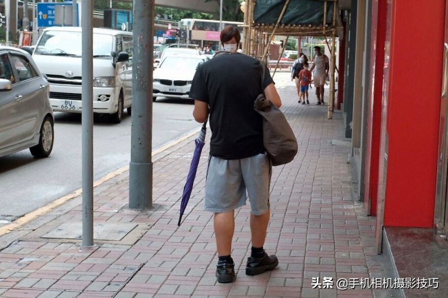 他被称为香港街拍之王：每一张照片都难以复制，诀窍在哪？