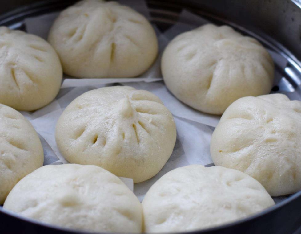 怎么蒸包子不塌陷不回缩,为什么包子出锅后又硬又回缩又黄