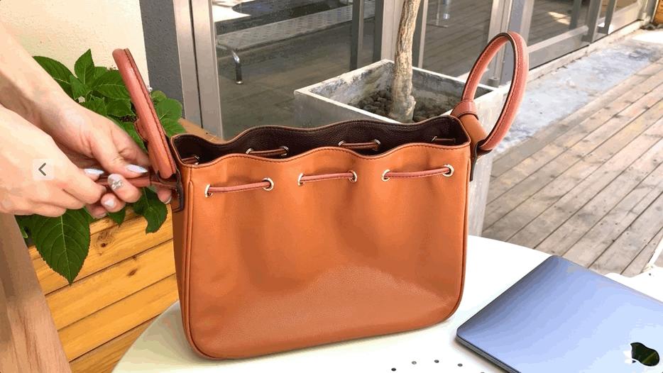 买了一大堆便宜包包,买了一个包回来发现包里有钱