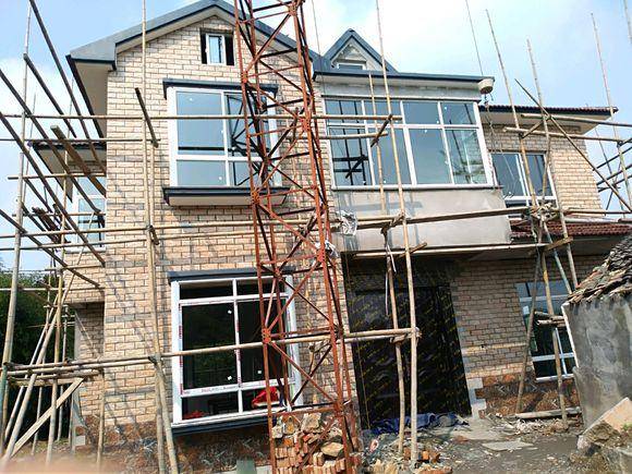 嘉兴小别墅,萧山小伙花200万造农村别墅