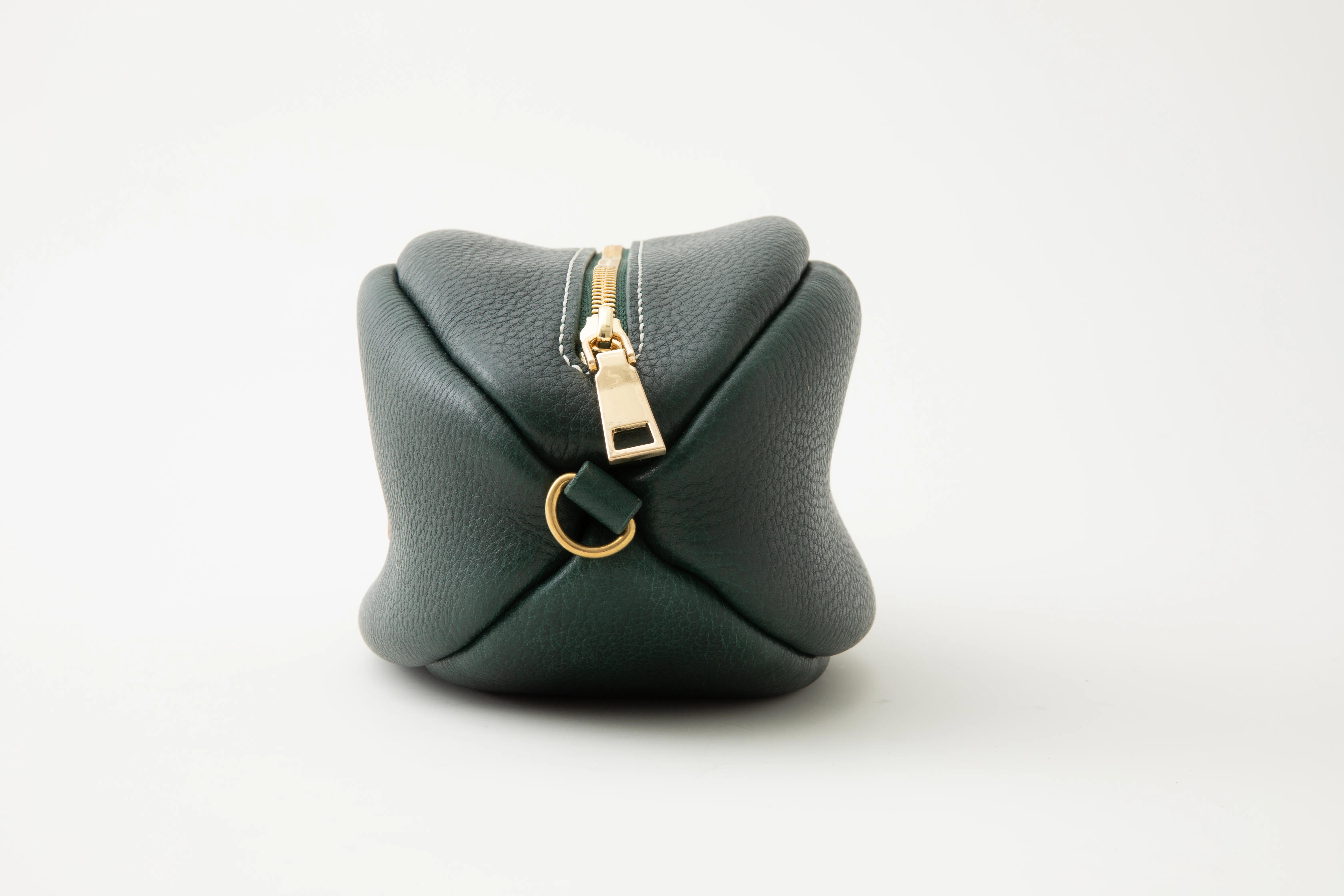 手工皮具橄榄球包制作,橄榄球型包包制作