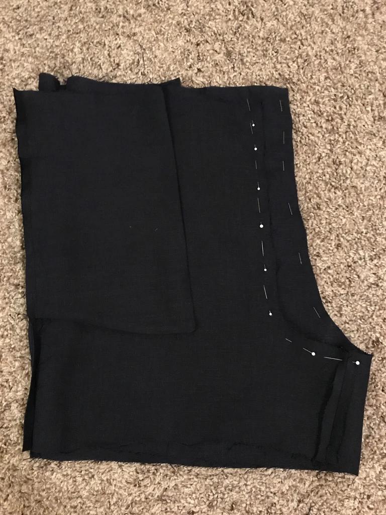 短裤一根布腰带的系法,短裤的一条裤带怎么系