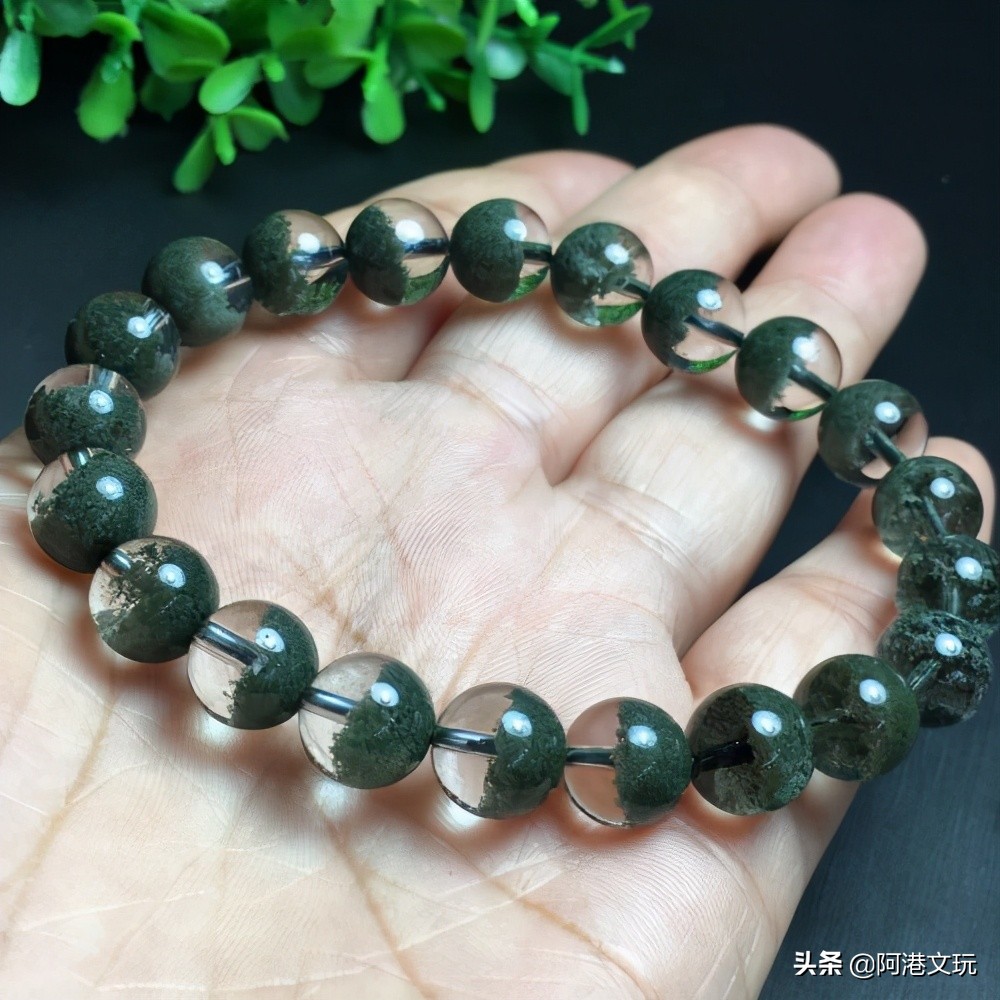 绿幽灵水晶柱怎么分辨真假,绿幽灵水晶的真假鉴别