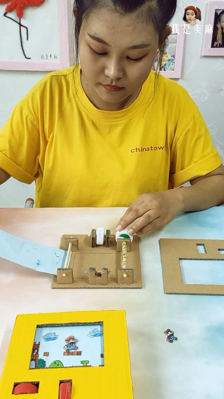 一个快递盒做了一个玩具,一个纸箱做一个游戏机