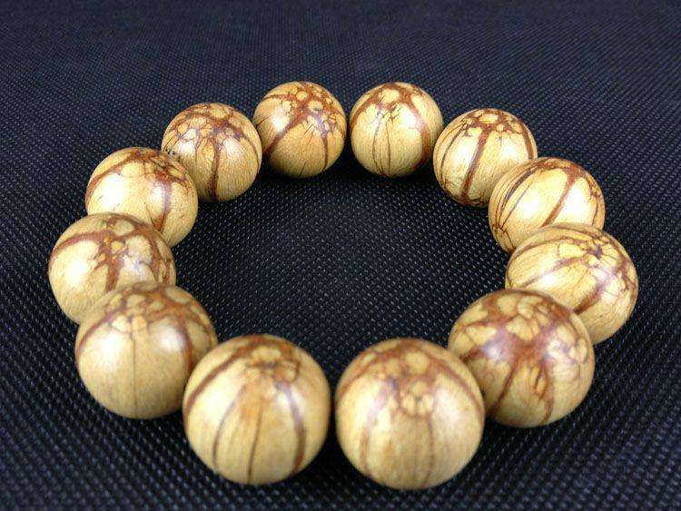 不怕水的文玩木质手串,有什么木质不怕汗文玩手串