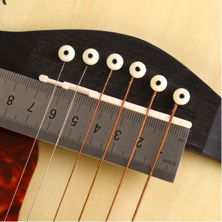 吉他为什么要换弦枕,如何取出吉他弦枕