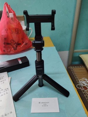 华为有线自拍杆的使用方法及操作,华为手机用自拍杆的使用方法图解