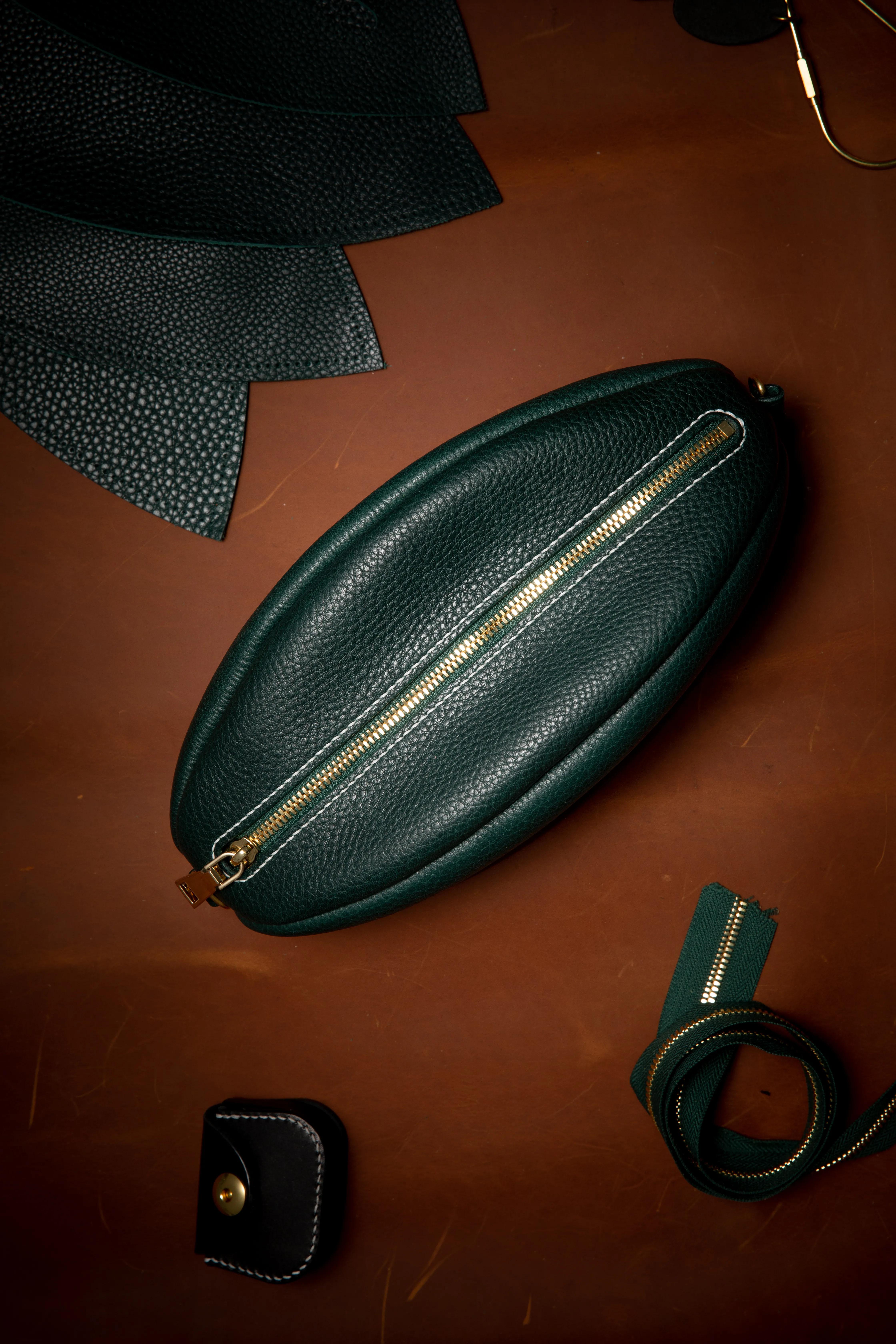 手工皮具橄榄球包制作,橄榄球型包包制作