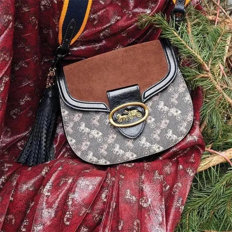 coach蔻驰马车邮差,coach蔻驰马车图案