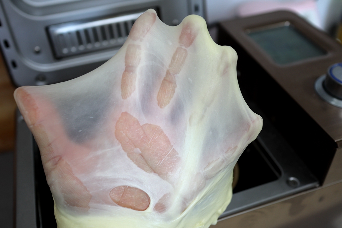 揉出了手套膜后如何做面包,用面包机揉手套膜后怎么烤