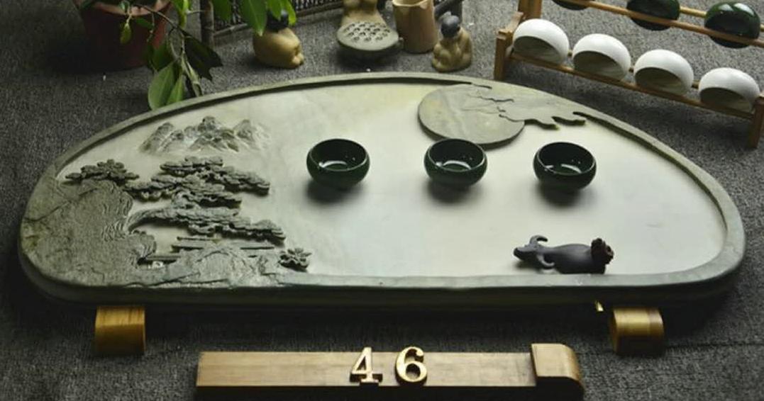 乌金石茶盘和端砚石茶盘哪个好,端砚石茶盘好还是电木茶盘好