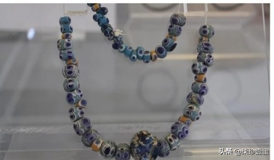 【古玩收藏与鉴赏】怎样辨别蜻蜓眼琉璃珠真伪。