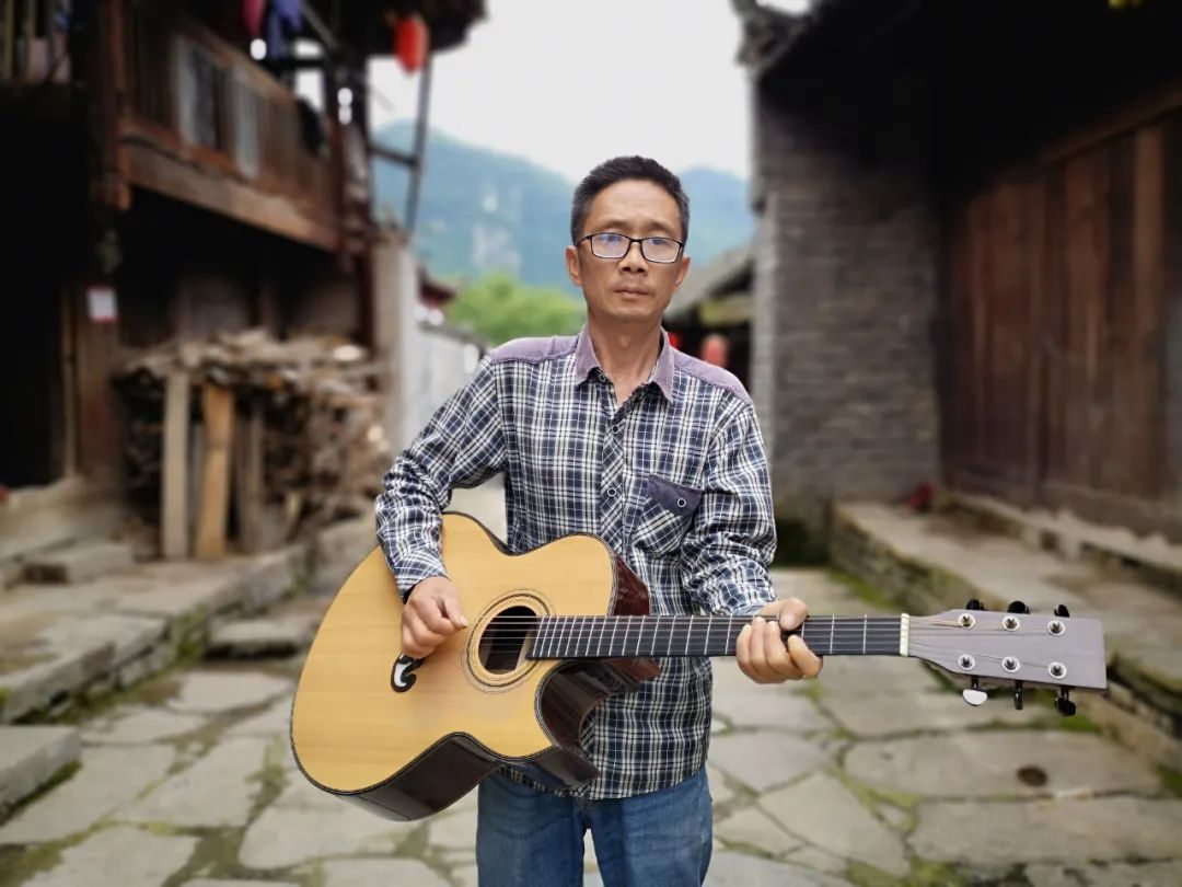 张家界吉他手工制作,张家界手工吉他