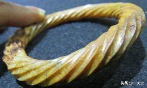 “六千年不出世则为泥”——古玉的地弯错牙化尘现象