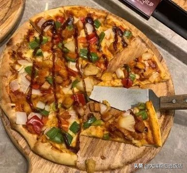 #吃遍大连#披萨的诱惑！一个蕴藏着芝士力量的神物