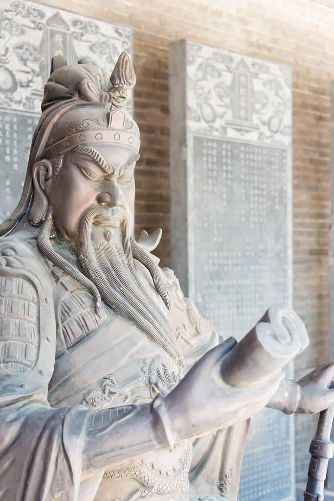 云南石雕关公人物雕像,关公雕像佛纹寓意