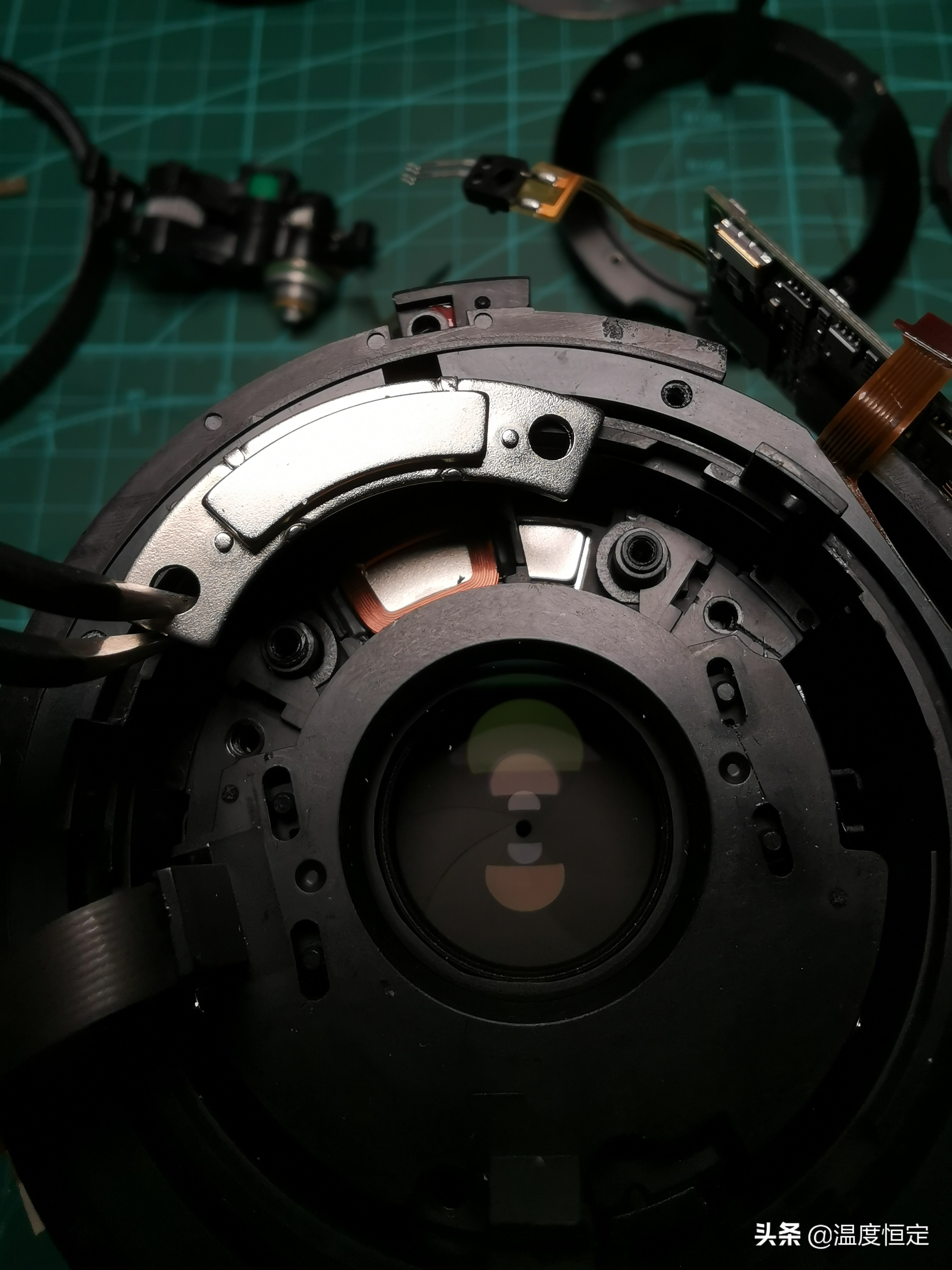 尼康镜头防抖打开一直响,尼康24-120镜头防抖怎么开