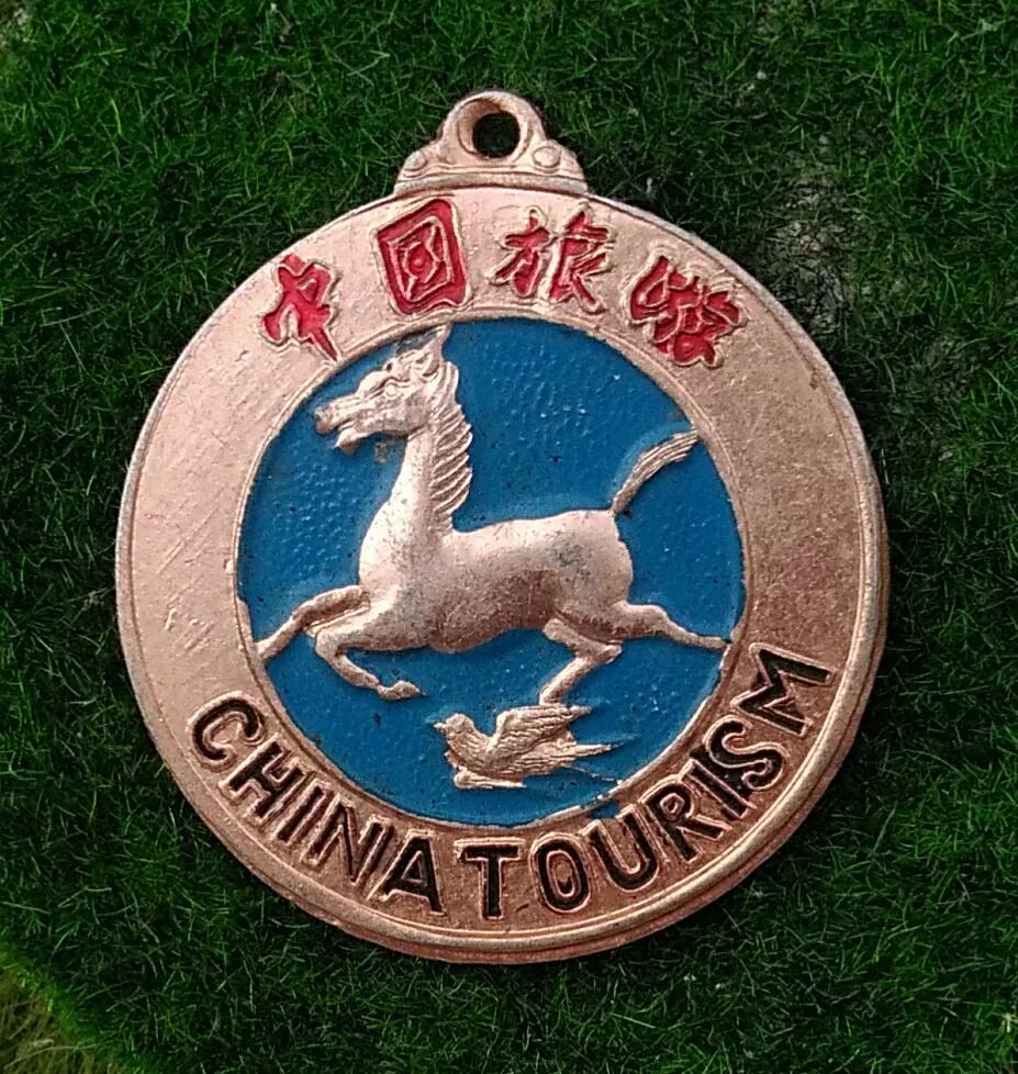 中国旅游日马踏飞燕的由来,什么是马踏飞燕徽标