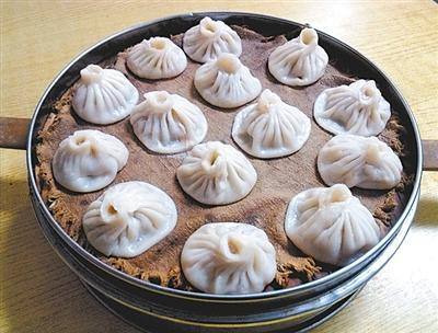 开封灌汤小笼包的做法和配方视频,四平开封小笼灌汤包