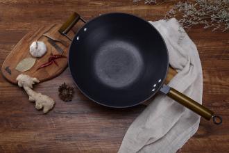 家里炒菜锅用生铁还是熟铁好,家里炒菜用生铁锅还是熟铁锅
