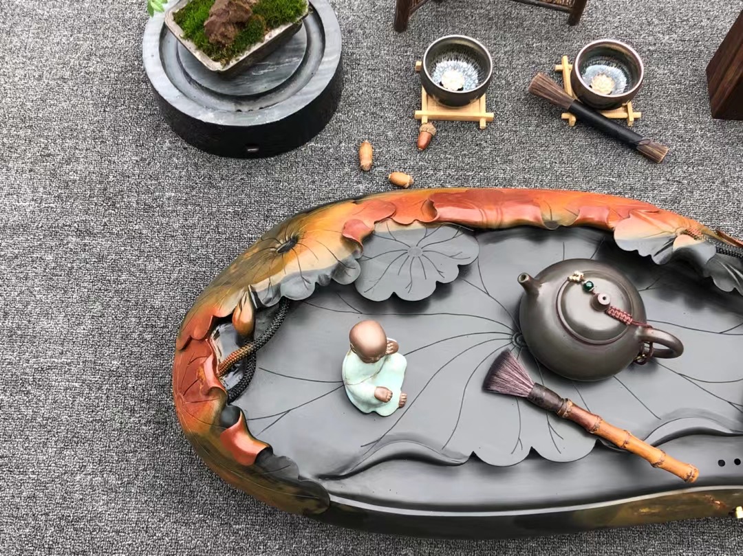人工雕刻石茶盘,小伙子石头雕刻二十万