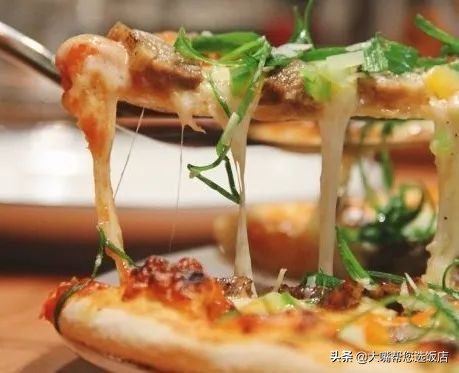 #吃遍大连#披萨的诱惑！一个蕴藏着芝士力量的神物