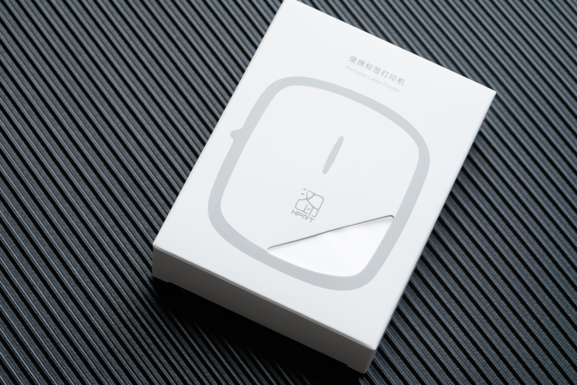 汉印hprtq2标签打印机装纸教程,汉印便携式小标签打印机使用方法