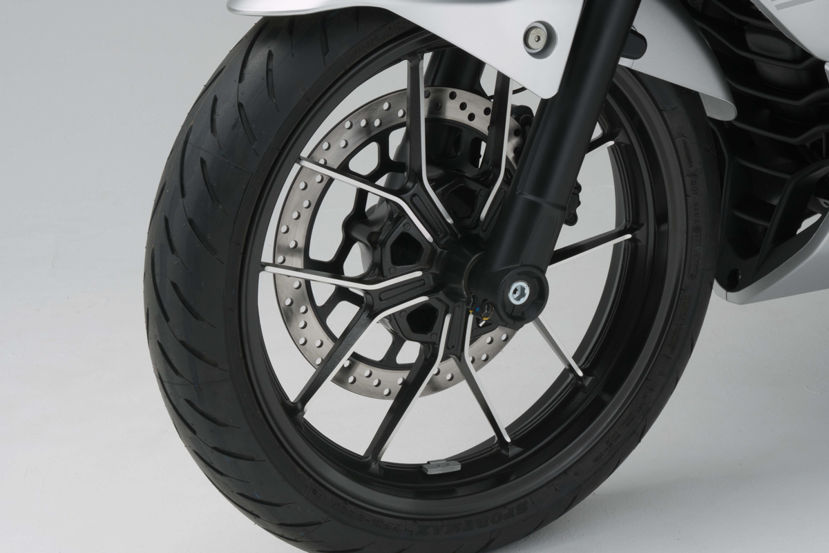 摩托水冷和风冷油冷哪个好,三轮摩托车是水冷好还是油冷好