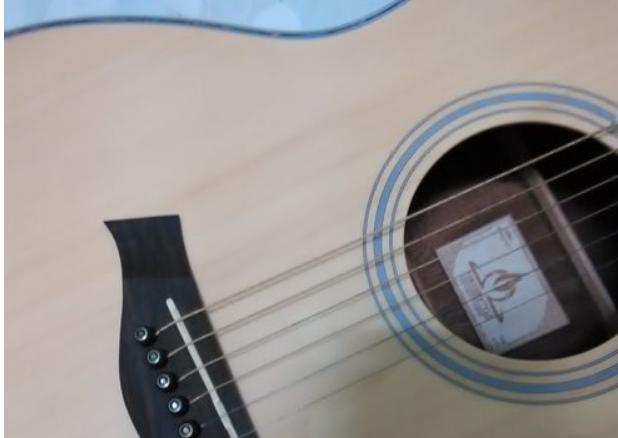 关于初学者如何选择吉他以及购买时的注意事项