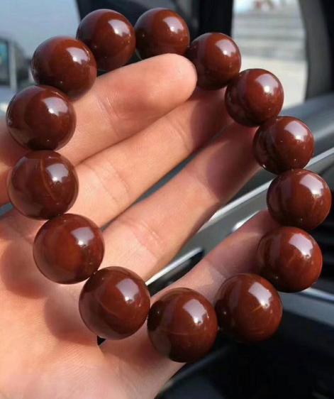 橄榄核正圆光珠孔道不正可以玩吗,橄榄核正圆光珠值得盘吗