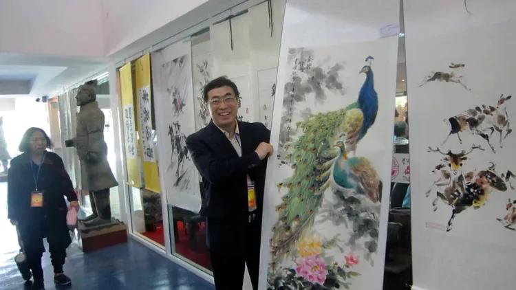 掌上乾坤指间生花世界级艺术家-贾同辉的“指墨”风釆